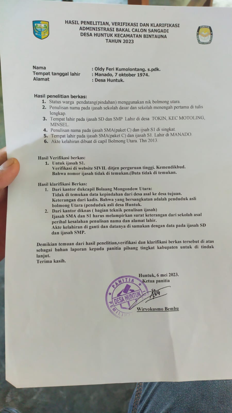 Surat keterangan yang disampaikan ke Dinas PMD Bolmut oleh Panitia Pilsang Desa Huntuk, perihal keganjalan berkas administrasi bakal calon Sangadi Oldy Feri Kumolontang 