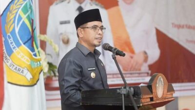 Pj Bupati Bolmut Sirajudin Lasena saat menyampaikan sambutannya di peringatan Hari Ibu ke-95