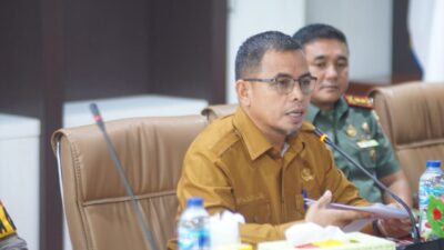 Pj Bupati Bolmut Sirajudin Lasena saat Rakor Forkopimda