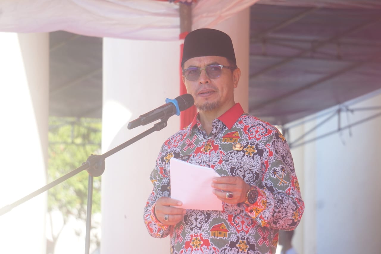 Pj Bupati Bolmut Sirajudin Lasena saat menyampaikan sambutannya di Apel Perdana tahun 2024