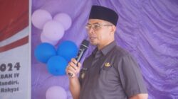 Pj Bupati Bolmut Sirajudin Lasena saat menyampaikan sambutannya di HUT ke-18 Desa Bohabak IV
