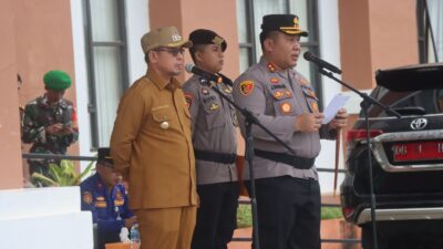 Kapolres Bolmut AKBP Juleigtin Siahaan saat memimpin apel kesiapan amankan Pemilu 2024 di Mako Polres Bolmut