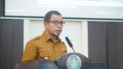 Pj Bupati Bolmut Sirajudin Lasena saat menyampaikan sambutannya di pembukaan Musrenbang Kabupaten